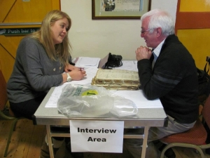 Harriet Linfoot from The Wildlife Trust interviews man about the old documents he brought